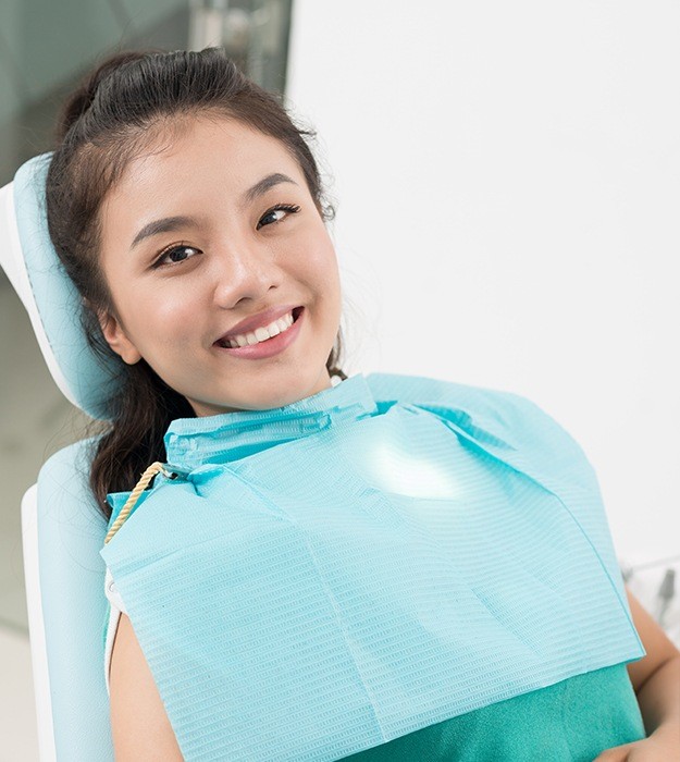 Smiling woman in dental chair