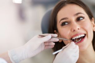 Woman getting a dental exam