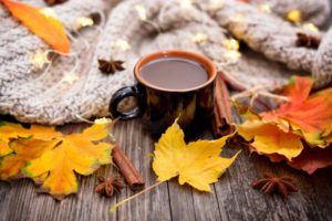 coffee with leaves surrounding it