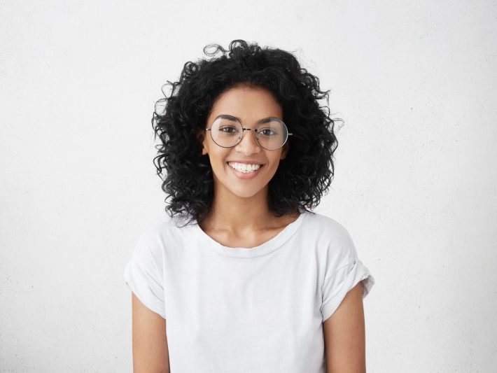 person with dental implants smiling