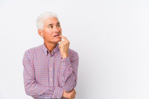 mature man with puzzled expression 