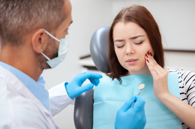 patient visiting emergency dentist in Spring House